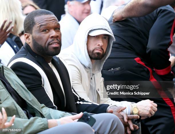 Cent and Eminem attend the Hollywood Walk of Fame Star Ceremony for Dr. Dre on March 19, 2024 in Hollywood, California.