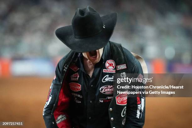 Leighton Berry celebrates after winning the bareback riding event during the shootout round of the Houston Livestock Show and Rodeo Championship on...