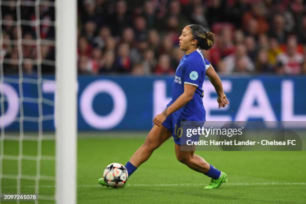 Lauren James of Chelsea scores her team's first goal during the UEFA Women's Champions League 2023/24 Quarter Final Leg One match between AFC Ajax...