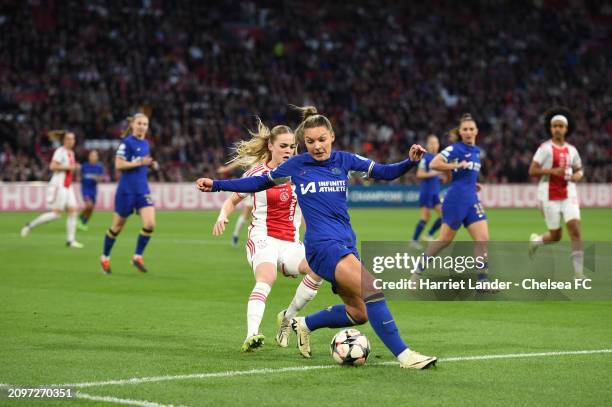 Johanna Rytting Kaneryd of Chelsea is challenged by Milicia Keijzer of Ajax during the UEFA Women's Champions League 2023/24 Quarter Final Leg One...