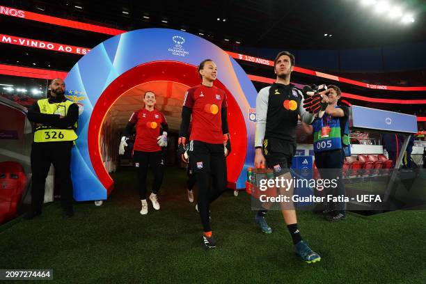 Christiane Endler and Laura Benkarth of Olympique Lyonnais walk to pitch for warm ups prior to the UEFA Women's Champions League 2023/24 Quarter...