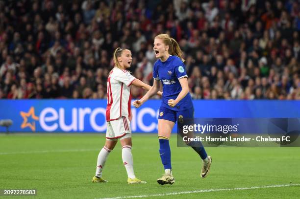 Sjoeke Nusken of Chelsea celebrates after scoring her team's third goal during the UEFA Women's Champions League 2023/24 Quarter Final Leg One match...