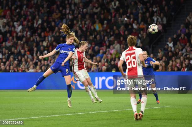 Sjoeke Nusken of Chelsea scores her team's third goal during the UEFA Women's Champions League 2023/24 Quarter Final Leg One match between AFC Ajax...