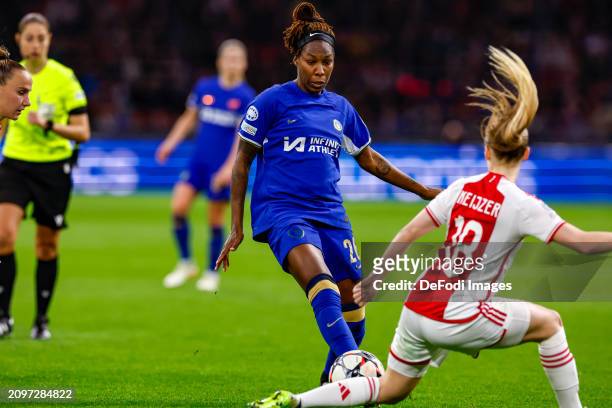 Kadeisha Buchanan of Chelsea FC shoots at the goal, defends by Milicia Keijzer of AFC Ajax during the UEFA Women's Champions League 2023/24 Quarter...