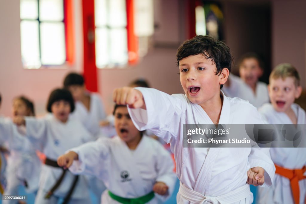 Karate training, Kids of different ages in kimono