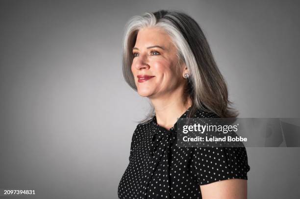 studio portrait of middle aged caucasian woman, gray hair - formal portrait stock pictures, royalty-free photos & images