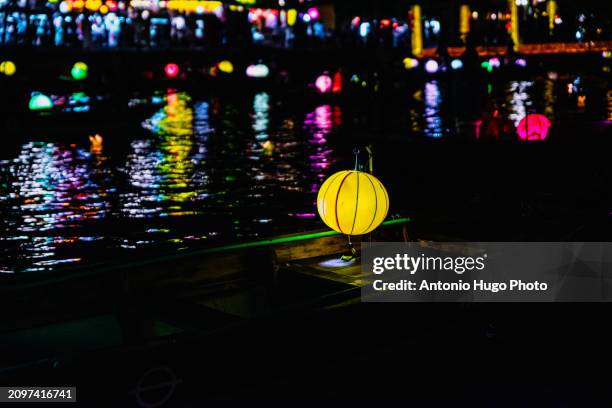 thu bon river at night in hoi an. in the background the japanese bridge - hanoi cityscape stock pictures, royalty-free photos & images
