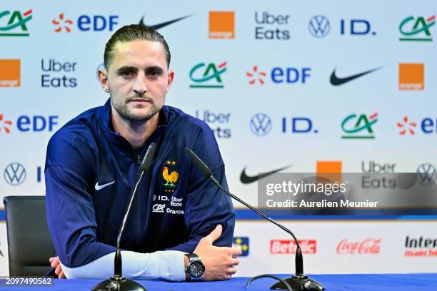 Adrien Rabiot answers journalists during a press conference at Centre National du Football on March 19, 2024 in Clairefontaine-En-Yvelines, France.