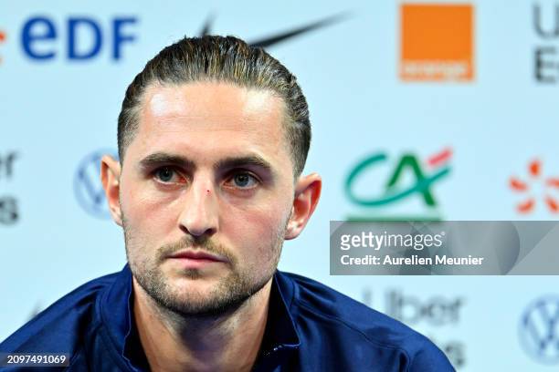 Adrien Rabiot answers journalists during a press conference at Centre National du Football on March 19, 2024 in Clairefontaine-En-Yvelines, France.