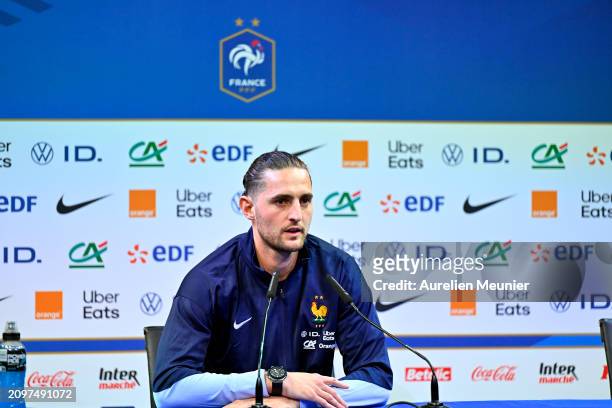 Adrien Rabiot answers journalists during a press conference at Centre National du Football on March 19, 2024 in Clairefontaine-En-Yvelines, France.