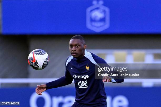 Randal Kolo Muani controls the ball during a France training session as part of the French national team's preparation for upcoming friendly football...