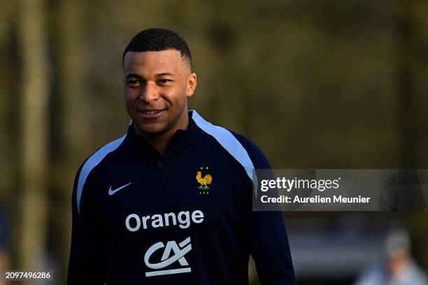 Kylian Mbappe looks on during a France training session as part of the French national team's preparation for upcoming friendly football matches at...