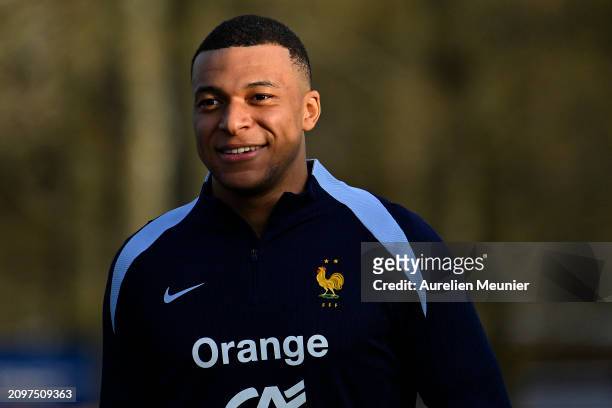 Kylian Mbappe looks on during a France training session as part of the French national team's preparation for upcoming friendly football matches at...