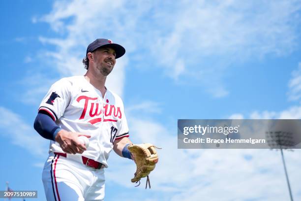 Kyle Farmer of the Minnesota Twins looks on during a spring training game against the Boston Red Sox on March 18, 2024 at the Lee County Sports...