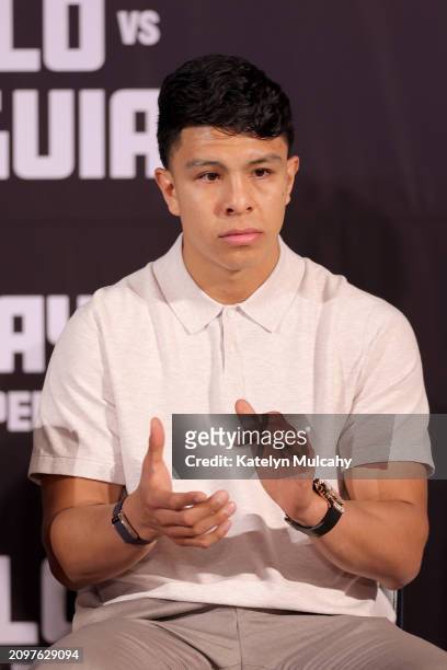 Jaime Munguia claps during a news conference to preview his super middleweight fight against Canelo Alvarez at The Beverly Hills Hotel on March 19,...