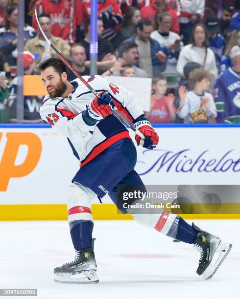 Tom Wilson of the Washington Capitals takes a shot during warm-up prior to their NHL game against the Vancouver Canucks at Rogers Arena on March 16,...