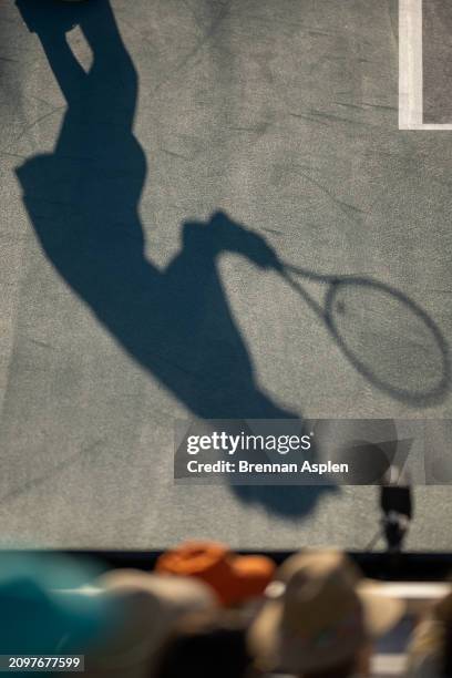 Paula Badosa of Spain shadow during her women's singles match against Simona Halep of Romania during the Miami Open at Hard Rock Stadium on March 19,...