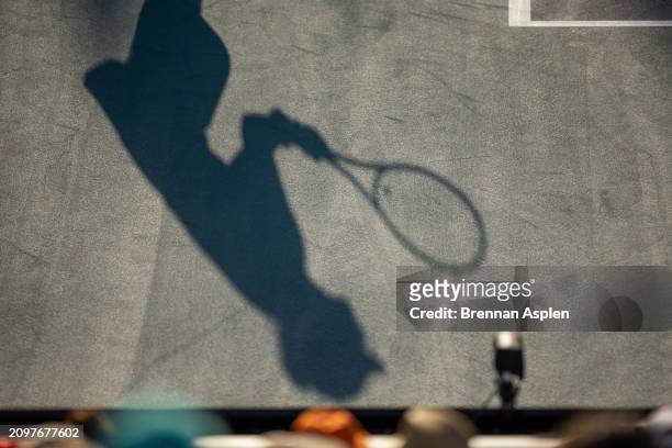Paula Badosa of Spain shadow during her women's singles match against Simona Halep of Romania during the Miami Open at Hard Rock Stadium on March 19,...