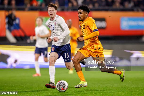 Odin Thiago Holm of Norway U21 battles for possession with Ian Maatsen of the Netherlands U21 during the U21 International Friendly match between...