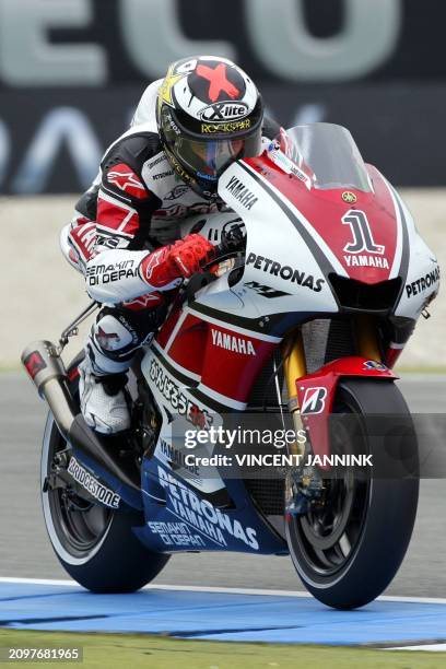 Spain's Jorge Lorenzo competes during the MotoGP at the Dutch grand Prix in Assen on June 25, 2011. AFP PHOTO / ANP / VINCENT JANNINK netherlands out...