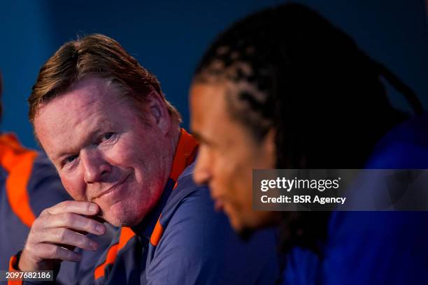 Netherlands head coach Ronald Koeman looks at Nathan Ake of the Netherlands during a Press Conference of the Netherlands Men's Football Team at the...