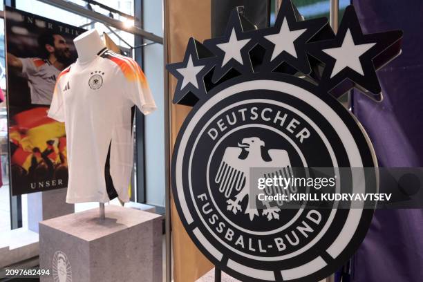 Germany's national team jerseys made by Adidas are pictured in official store on March 22, 2024 in Frankfurt am Main, western Germany ahead German...