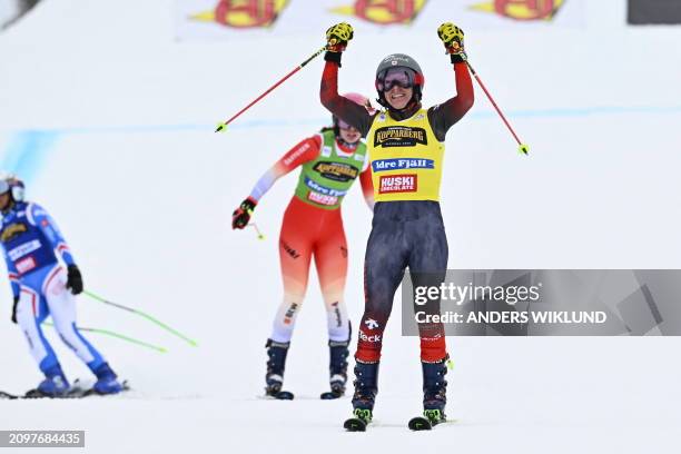 Canada's Brittany Phelan celebrates after competing in the women's big final of the ski cross event of the FIS World Cup at Idre Fjäll, Sweden, on...