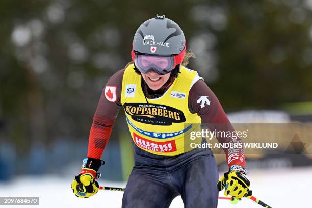 Canada's Brittany Phelan celebrates after competing in the women's big final of the ski cross event of the FIS World Cup at Idre Fjäll, Sweden, on...