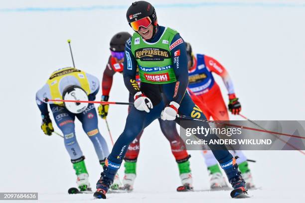 Sweden's David Mobaerg reacts after winning the men's big final of the ski cross event of the FIS World Cup at Idre Fjäll, Sweden, on March 22, 2024....