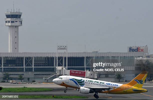 Cebu Pacific plane takes off at the Ninoy Aquino International Airport in Manila on October 26, 2010. Philippine budget airline Cebu Pacific said it...