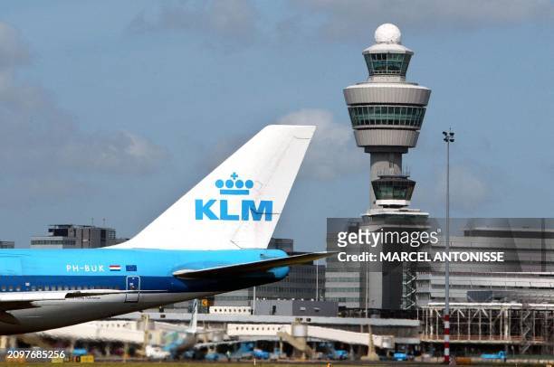 This photo taken 11 June 2003 shows KLM planes parked at Schiphol airport, Netherlands. The French government, which seeks to privatise Air France,...