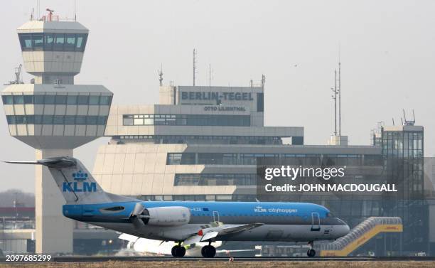 An aircraft of the Dutch airline company KLM takes off from Tegel airport in Berlin 30 March 2006. AFP PHOTO JOHN MACDOUGALL