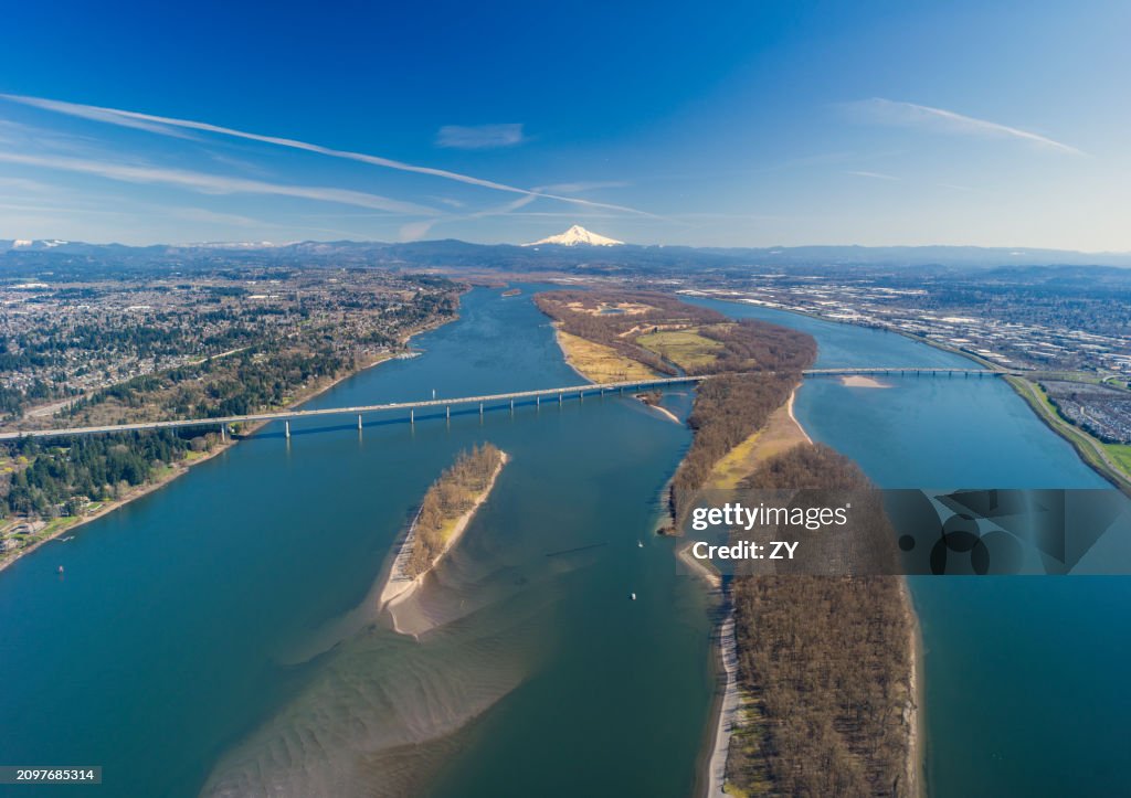 Aerial View of Government Island and I-205 Bridge Crossing the Columbia River with Mount Hood in Background