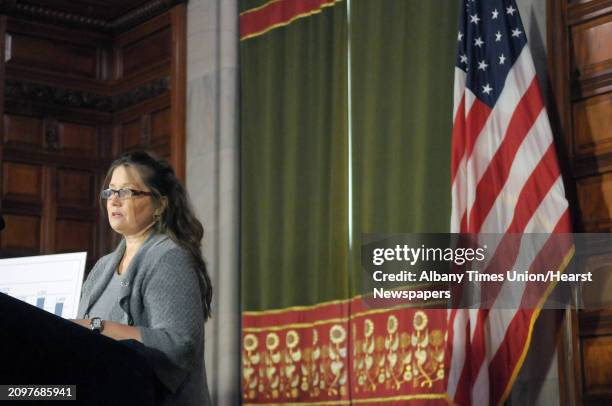 Ann M. From Queens, NY, addresses those gathered at a press conference on the Governor's bill to expand the DNA Databank at the capitol on Wednesday,...