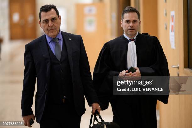 The former chairman and current owner of SCO Angers football club , Said Chabane's lawyers Bernard Benaiem and Pascal Rouiller arrive for the verdict...