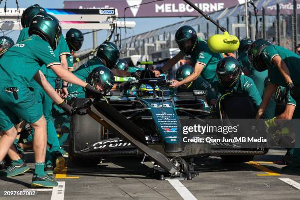 Fernando Alonso of Spain in the Aston Martin AMR23 Mercedes during a pit stop during practice ahead of the F1 Grand Prix of Australia at Albert Park...