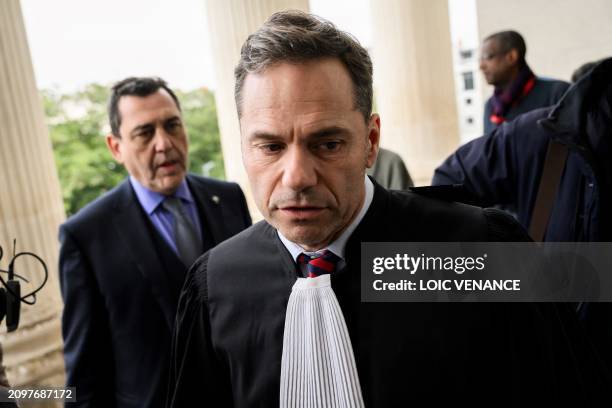 The former chairman and current owner of SCO Angers football club , Said Chabane's lawyers Bernard Benaiem and Pascal Rouiller arrive for the verdict...