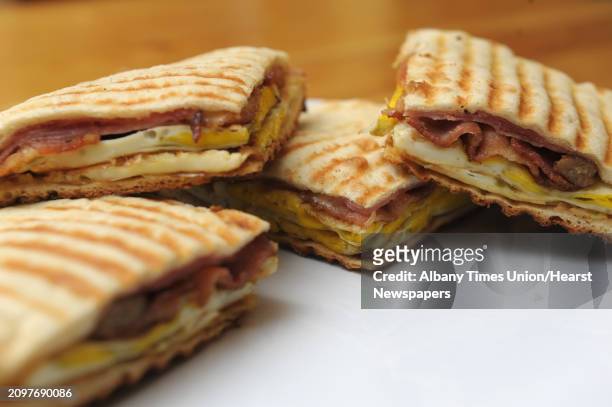 View of The Hungry Man, eggs, bacon, ham, sausage, American cheese on panini bread and pressed on a panini grill at the Route 67 Country Store and...