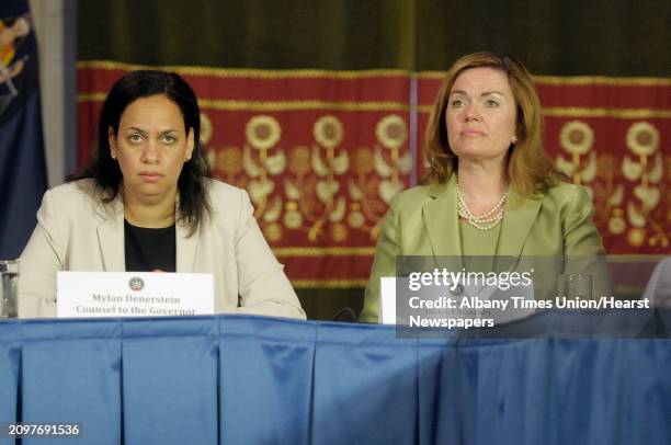 Mylan Denerstein, left, counsel to the Governor, and Kathleen Hogan, Warren County district attorney, take part in a press conference at the Capitol...