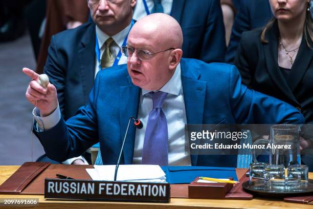 Russia's Ambassador to the United Nations Vasily Nebensya speaks to delegates after voting against a U.S. Ceasefire resolution for the Gaza war...