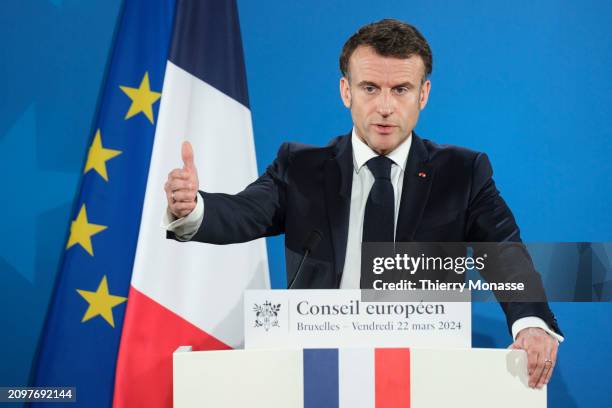 French President Emmanuel Macron speaks to media at the end of an EU Summit in the Justus Lipsius building, the EU Council headquarter on March 22,...