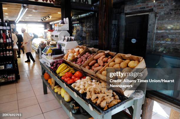 Fresh produce is seen in bins during the grand opening of The Grocery store at 211 Broadway on Tuesday, Oct 2013 in Troy, NY. The husband-and-wife...