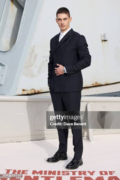 Hero Fiennes-Tiffin attends the London photocall for "The Ministry Of Ungentlemanly Warfare" at HMS Belfast on March 22, 2024 in London, England.