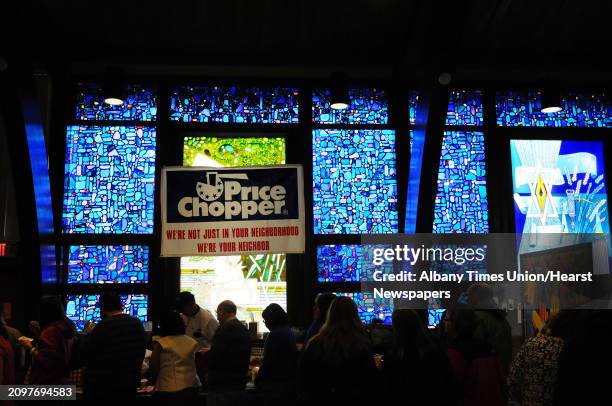 People line up to try the foods available at the Price Chopper booth at the 11th Annual Jewish Food Festival at the Congregation Gates of Heaven on...