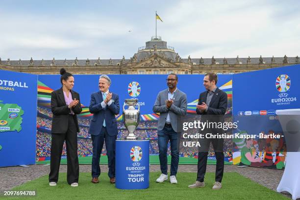 Celia Sasic, Vice-President of DFB, Frank Nopper, Mayor of Stuttgart, Cacau and Philipp Lahm, Tornament Director arrive by a bus at Schlossplatz...