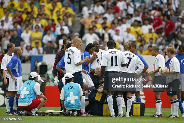 Ronaldinho of Brazil and England Players in incident during the FIFA World Cup Finals 2002 Quarter Final match between England and Brazil at Shizuoka...