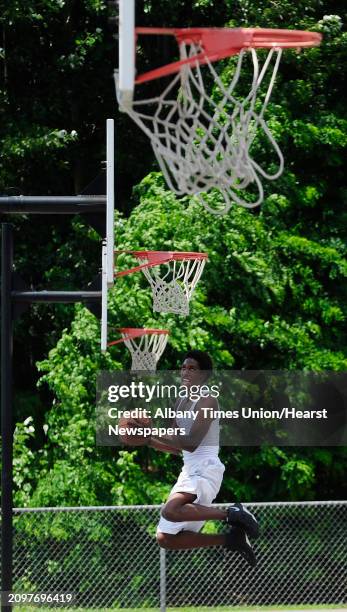 Devon Jordan of Schenectady practices his basketball skills at Central Park on Monday, July 14 in Schenectady, N.Y. Jordan moved to the area from...