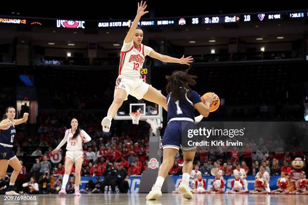 Celeste Taylor of the Ohio State Buckeyes defends against Olivia Rockwood of the Maine Black Bears during the second quarter of the NCAA Women's...