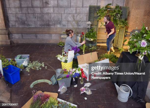 Jenna Malette, left, assistant designer at Farmhouse Floral Design in Middleburgh, and Jess Beretz, owner of Farmhouse Floral Design, work on a...