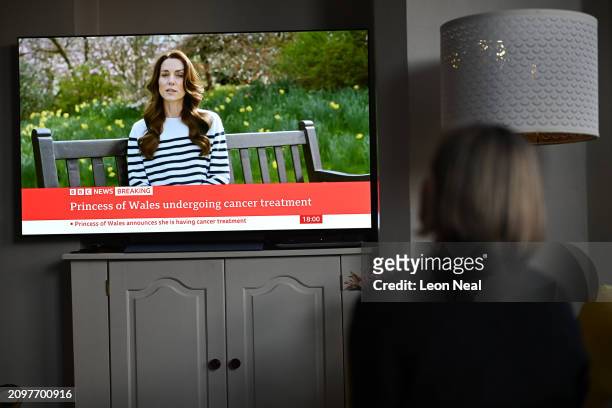 Relative of the photographer watches television, as Catherine, The Princess of Wales announces that she is receiving a preventative course of...